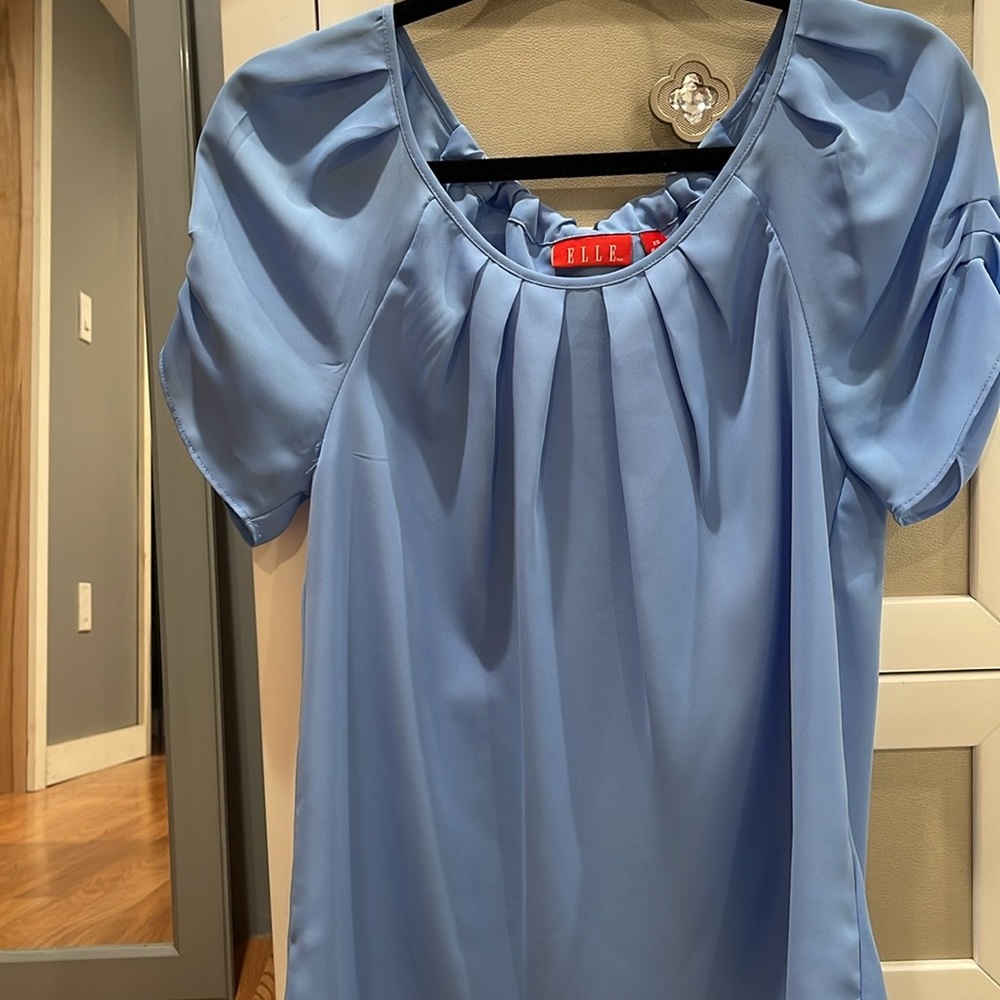 These are all blouses that can be worn to work and after work happy hour.